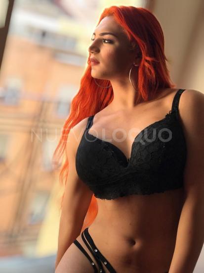  Hermosa Pelirroja y  capaz