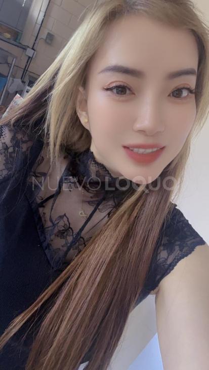  Chica asiática y guapa, muy cerca