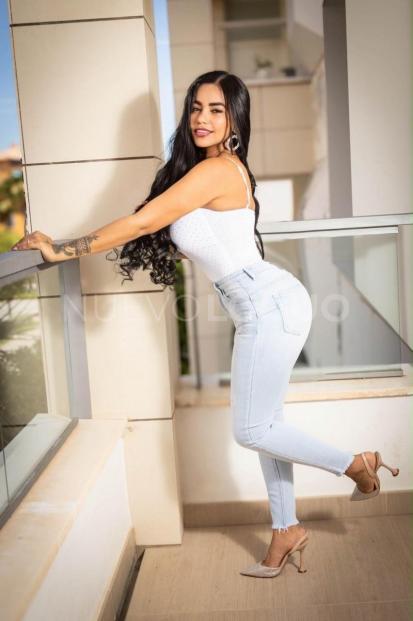  exótica, guapa, soy un encanto